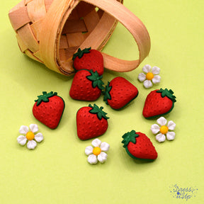 a shank-back button pack of strawberries and strawberry blossoms for spring crafting