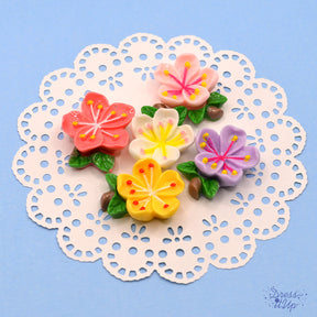 five large resin flower buttons for diy crafting