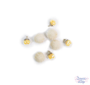 Faux fur and globes filled with glitter are perfect to create fun jewelry and charms