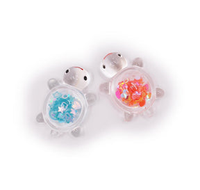 resin sequin filled clear turtle embellishments for crafting. 