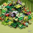 A huge assortment of green-themed buttons and embellishments