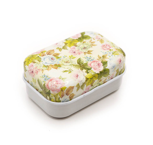 Reusable tin filled with pastel flowers