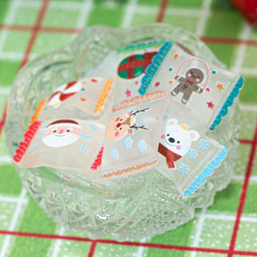 faux resin Christmas candy craft button on a green checkered background