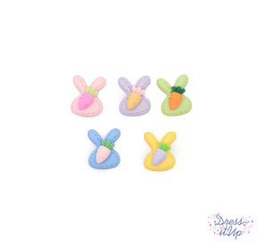 Colorful bunny shaped embellishments with carrots add to Spring and Easter projects