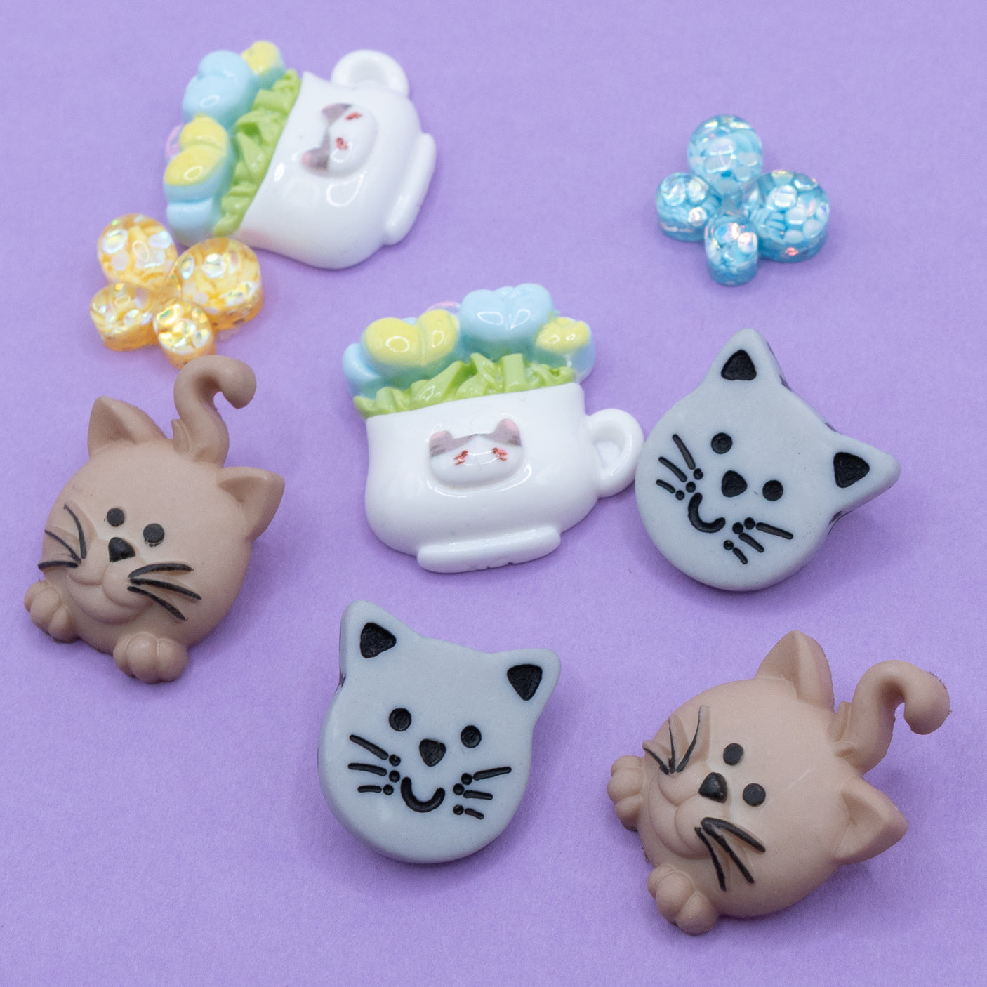This pack includes adorable cats, kitty vase with tulips and glittery resin butterflies. Perfect for DIY crafts and gifts.