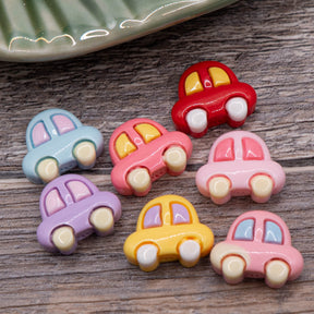 pastel car craft embellishments on wood background