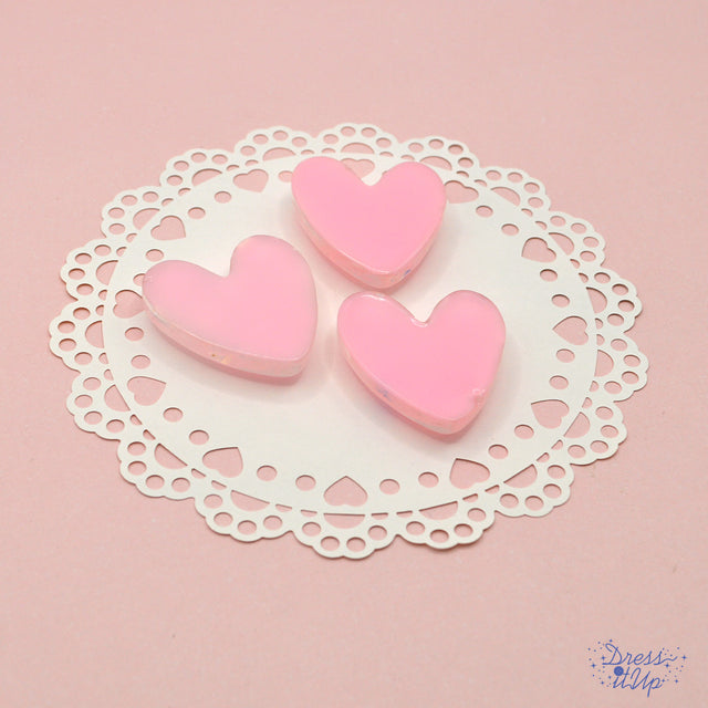 Pink flat-back resin hearts with iridescent flakes 