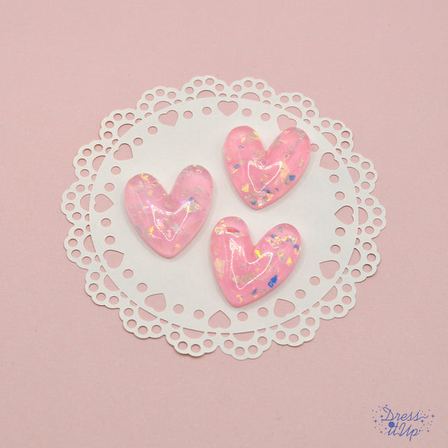 Pink flat-back resin hearts with iridescent flakes 