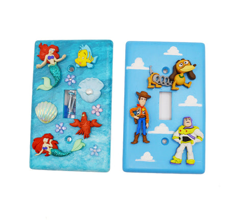Dress up light switch covers with Disney's The Little Mermaid and Toy Story buttons