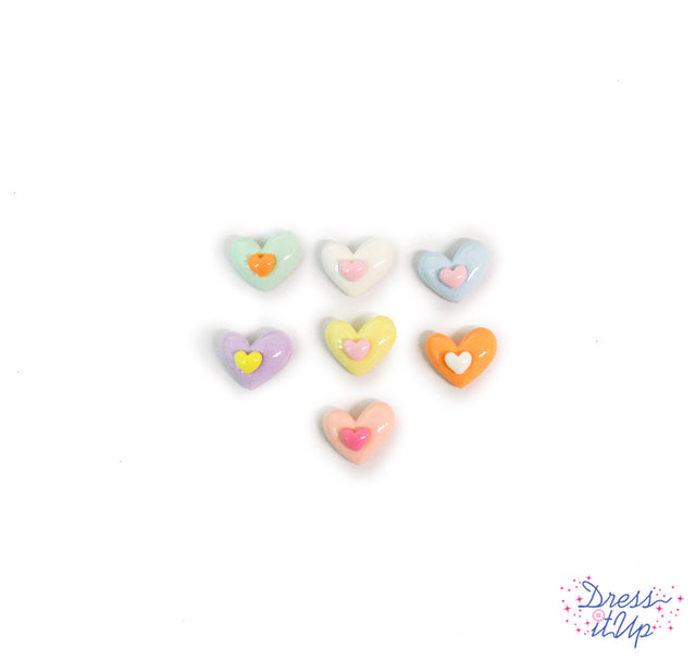Pastel heart embellishments add a soft touch to crafts and projects