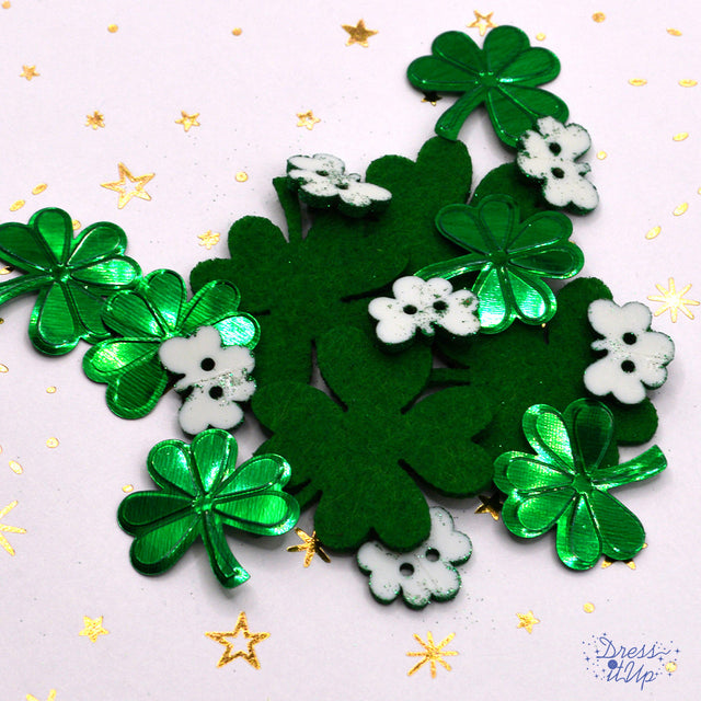 Green shamrocks in felt and shiny plastic add to St. Patrick's Day and Irish crafts