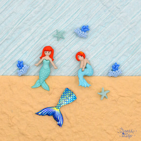 starfish, mermaids, and waves in bright teal colors for summer and girl crafting projects