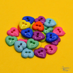 two-hole heart buttons in bright colors