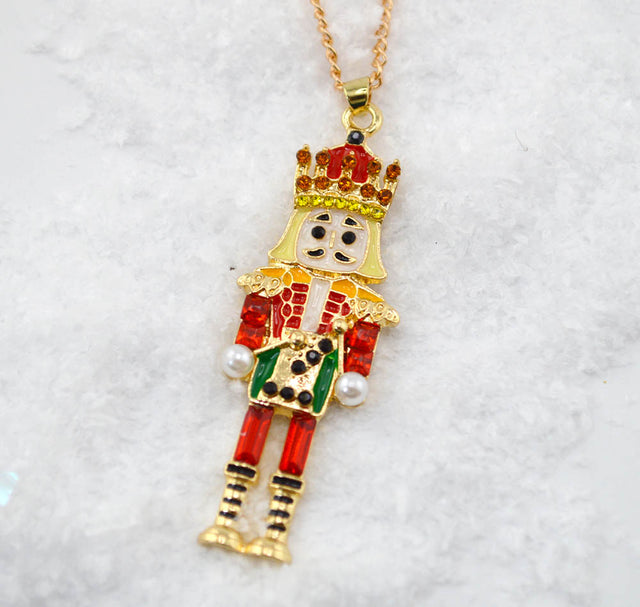 Golden Nutcracker Enamel Pendant Necklace