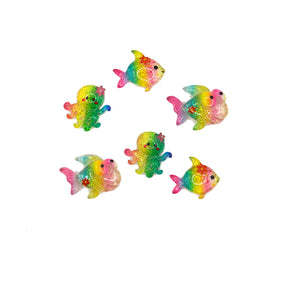 A pack of rainbow color resin fish for crafting 