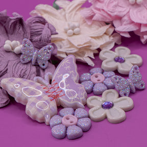 Lavender butterfly and flower craft embellishments make perfect decorations for wood, paper, and fabric crafts