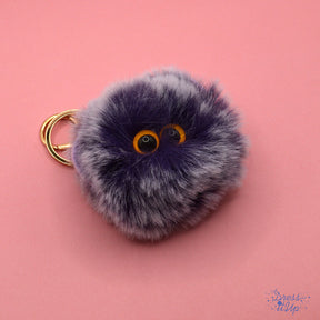 Purple puff ball with eyes adds to bag and keychain projects