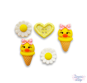 Cones with duck heads ice cream, paired with daisies and a glitter heart, add whimsy to spring and children's projects
