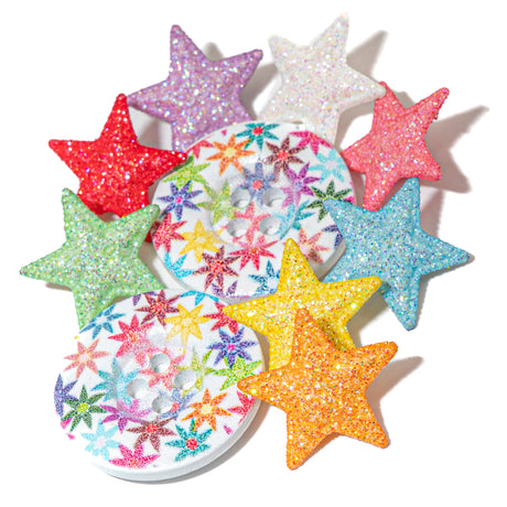 Colorful star-shaped decorations with glitter on a white background
