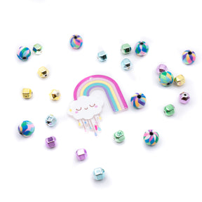 resin cloud and rainbow charm with plastic and lay beads.