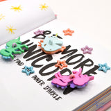 Pastel colored unicorns and beaded tiny star craft embellishments. 