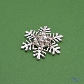 Sparkling rhinestones and enamel detailing add to holiday crafts and jewelry projects