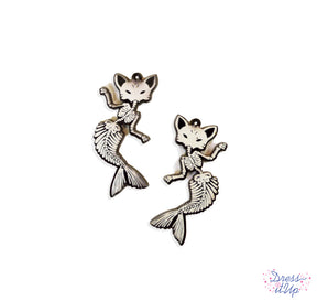 Dark and spooky mermaid skeleton charms perfect for gothic jewelry and crafts