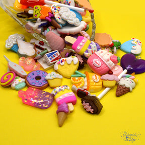 Huge assortment of candy and goodies with flat-back and shank-back buttons and embellishments