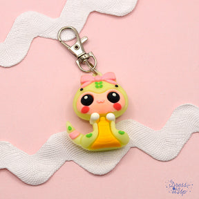 An adorable snake design is perfect to add to jewelry and keychains