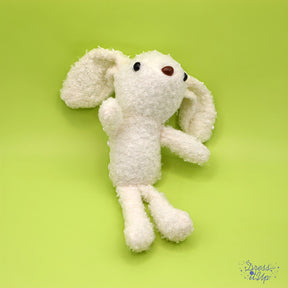 Stuffed white rabbit adds to backpacks and keychains