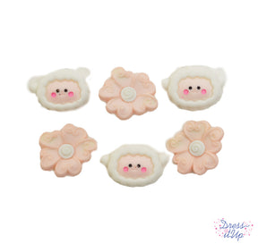 Baby lambs and soft flowers add to nursery decor and baby shower crafts