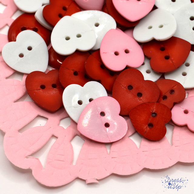 two-hole pink, white, and red sewing heart buttons for fabric, wood, and paper crafts