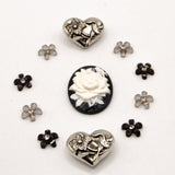 black, white, and silver metal vintage floral themed embellishment pack for crafting.