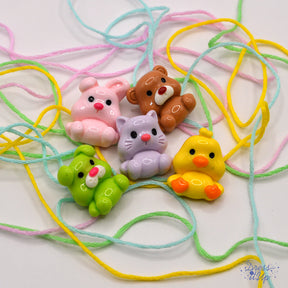 Adorable baby animals for crafting projects. Yellow duck, pink bunny, brown teddy bear, purple cat and green dog.