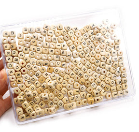 Large brown wood letter bead button mix for jewelry making and crafting. 