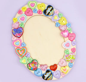 Oval wood frame for painting and crafting.