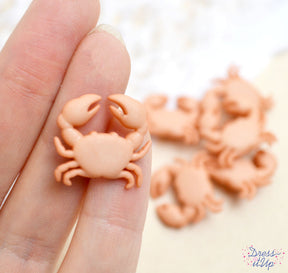 Tiny crabs are perfect to add to beach and ocean themed crafts