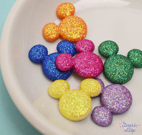 Colorful Mickey Mouse heads adorned with glitter add a pop to Disney and children's projects
