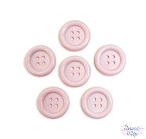 Large round 4-hole sewing buttons in light pink perfect for sewing and crafts