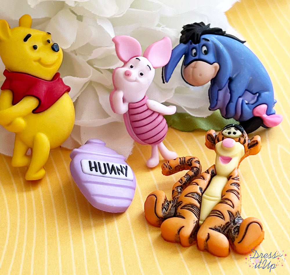 Four characters and a hunny pot from the Disney classic movie Winnie the Pooh