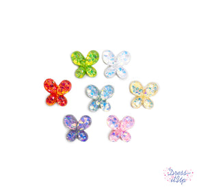 Each flat-back butterfly features sparkly sequins inside of crystal clear resin, perfect for spring crafts