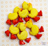 Bright yellow ducks in rainboots add to create fun spring and rainy day projects