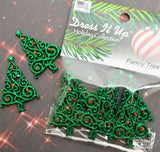 Green glittery Christmas trees are ready to embellish your holiday crafts