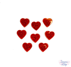 Red glittery hearts are perfect to add to Valentine's Day projects