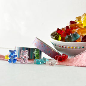Seven glittery resin gummi bear embellishments perfect for children's and candy crafts