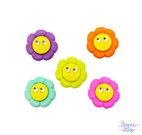 Bright flowers with smiling faces add a whimsical touch to garden crafts and children's projects