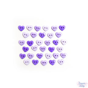 Light shades of purple adorn heart shaped sew-thru buttons for sewing and crafting