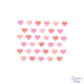 Tiny sew-thru buttons in shades of pink perfect for sewing and crafting