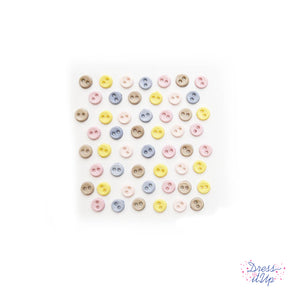 Tiny 2-hole buttons in pastel colors embellish your sewing and crafts
