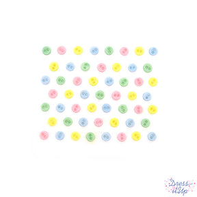 Tiny sew-thru buttons in colors perfect for baby clothes and nursery crafts